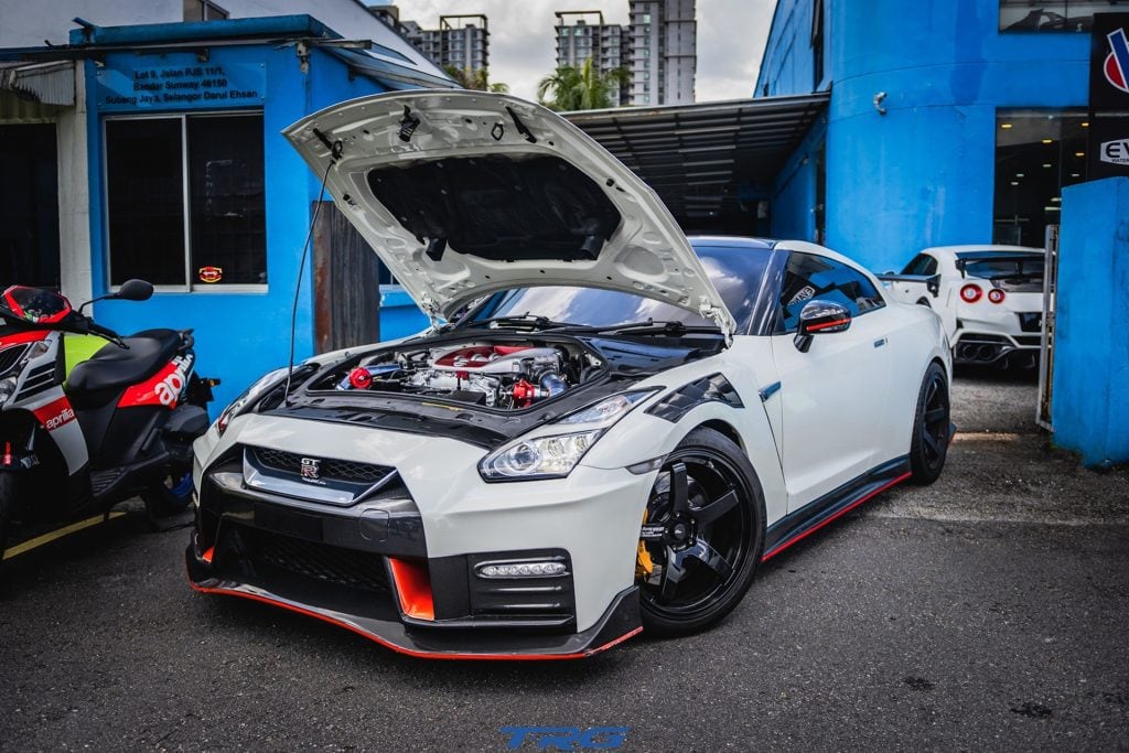 White Nissan GT-R NISMO with bonnet open at TopRacing Garage