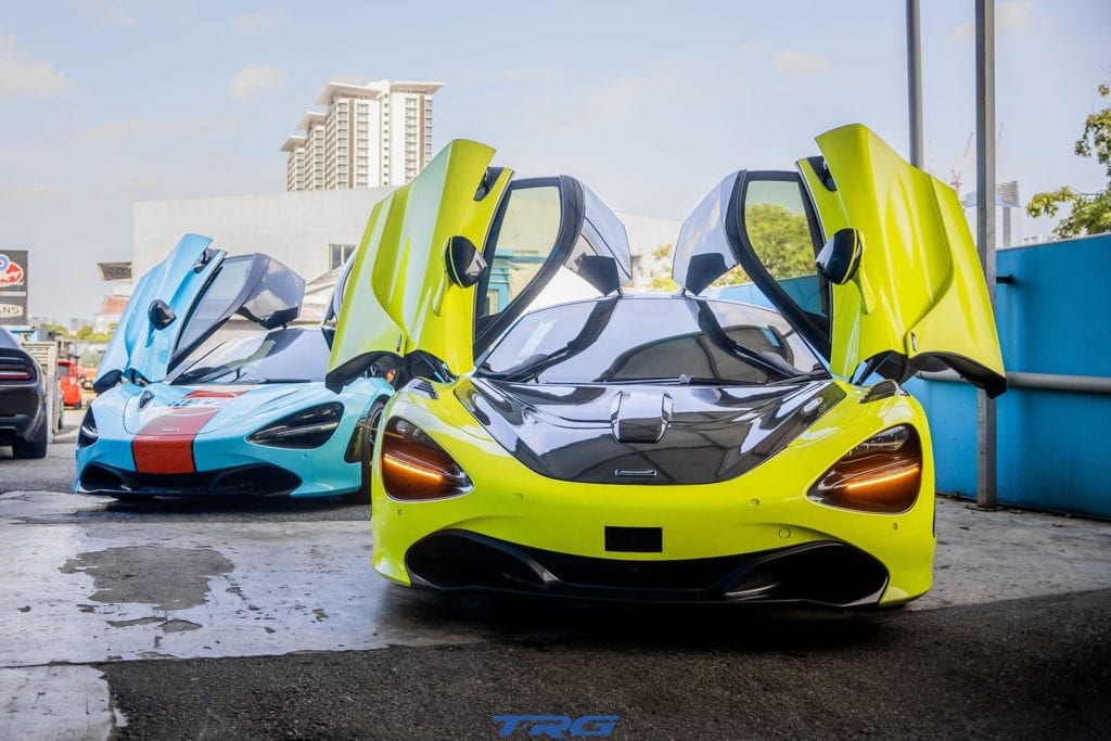 Two McLaren 720S supercars outside TopRacing Garage